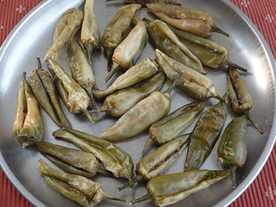 drying green chili for sandige menasu or majjige menasu