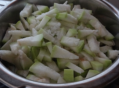 cooking bottle gourd for sorekai sambar or bottle gourd sambar