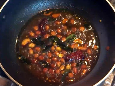 boiling tamarind for tamarind rice or huliyanna