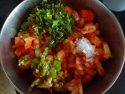 coriander leaves and green chili for tomato salad