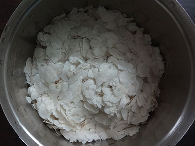 rinse and soak beaten rice or poha for uddina dose or plain dosa