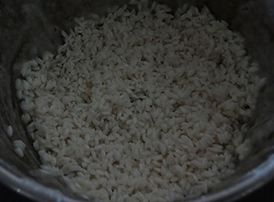 rice in the grinder for uddina dose or plain dosa