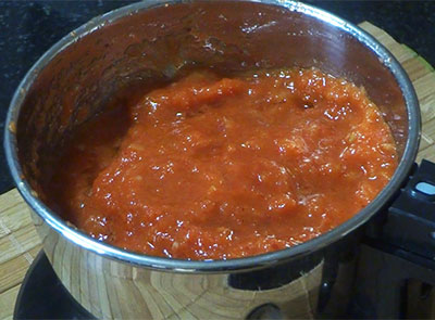 ground tomato and onion for tomato onion chutney or red chutney
