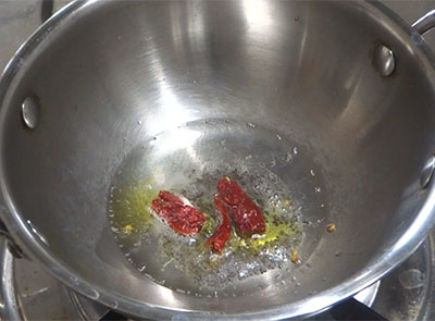 tempering for tomato onion chutney or red chutney