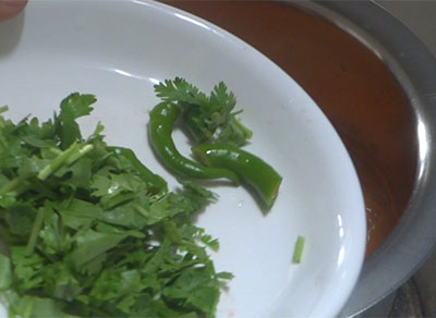green chili and coriander leaves for simple tomato rasam or saru