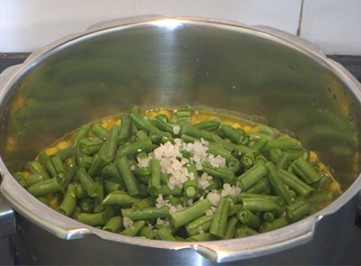 cooking vegetabes for beans sambar recipe or huralikayi huli
