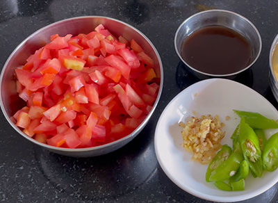 chopped chilli, ginger and tomato for dideer bele saaru or simple dal rasam