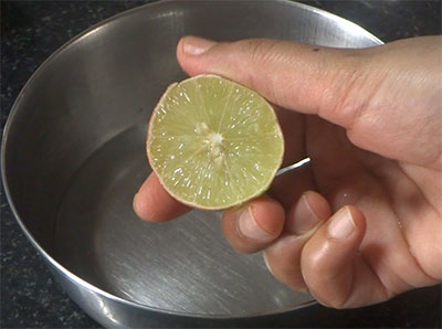 water and lemon juice for how to clean stove burner