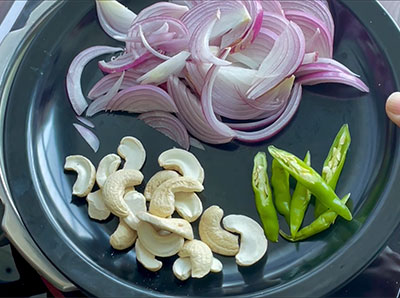 cashews, onion and green chillies for coconut milk pulao or kaayi haalina rice recipe
