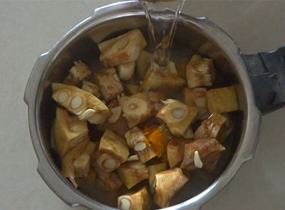 cooking vegetables for halasinakayi huli or raw jackfruit sambar