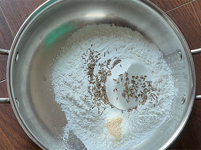 rice flour, cumin seeds and hing for hesaru bele chakli or moong dal murukku recipe