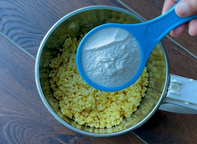 rice flour in mixer grinder for mung dal dosa or hesaru bele dose