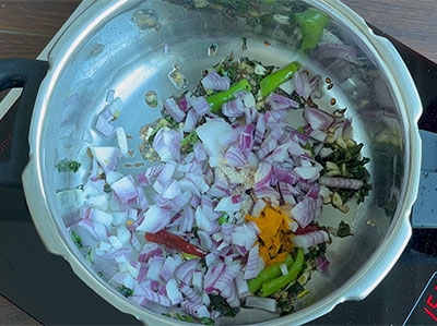 onion, turmeric and hing for nugge soppu or drumstick leaves or moringa dal