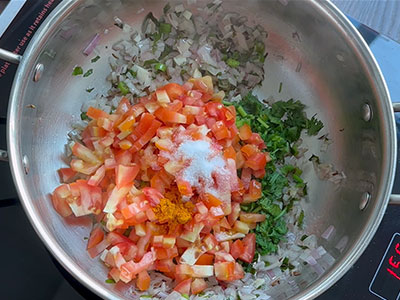 tomato, salt and turmeric for onion tomato paratha or masala chapati