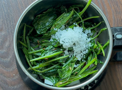 fried leaves and salt for palak soppu tambli recipe or spinach tambuli
