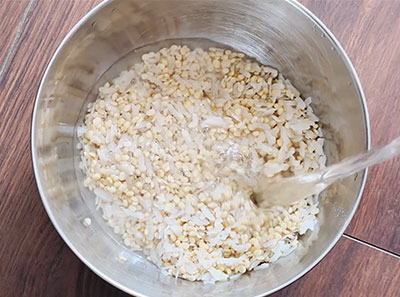 soaking urad dal, methi seeds and poha for ragi godhi dose or ragi flour wheat flour dosa