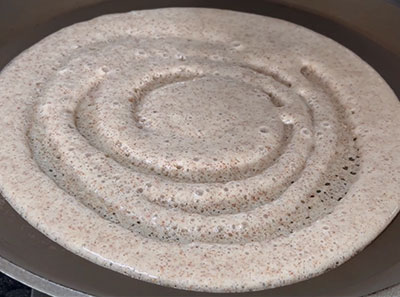making ragi godhi dose or ragi flour wheat flour dosa
