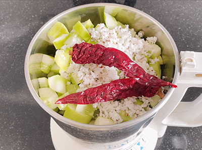 grated coconut and red chilli for southekai dose or cucumber dosa recipe